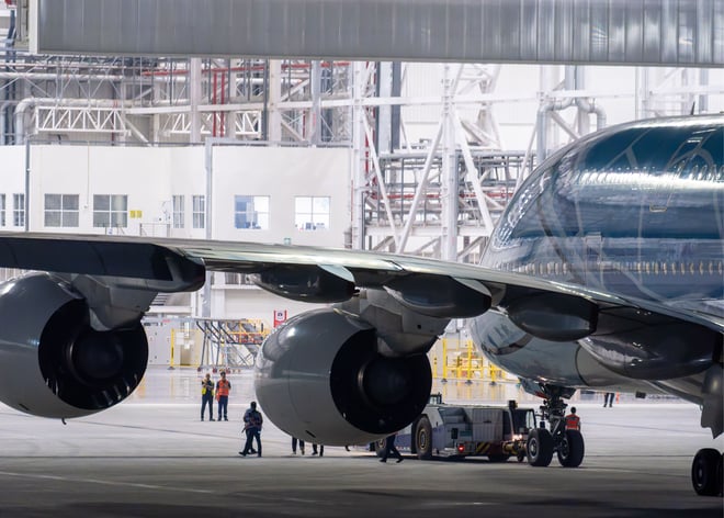 Aircraft undergoing work in an aviation hangar